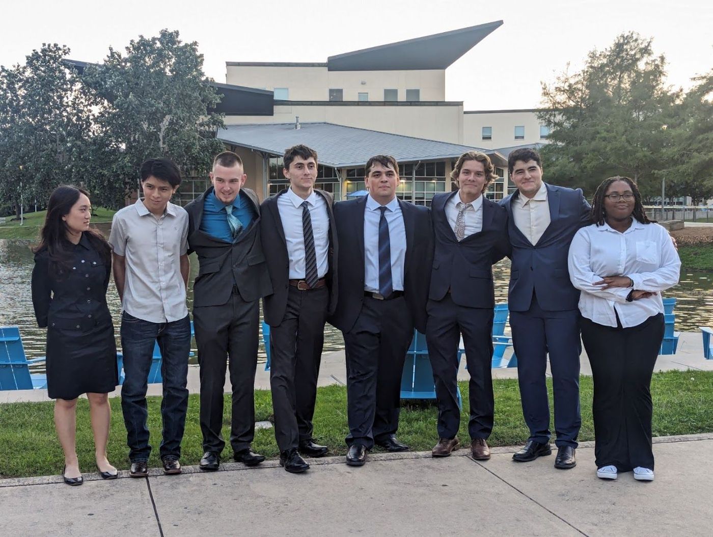 Alamo Academies students in professional dress outside the campus