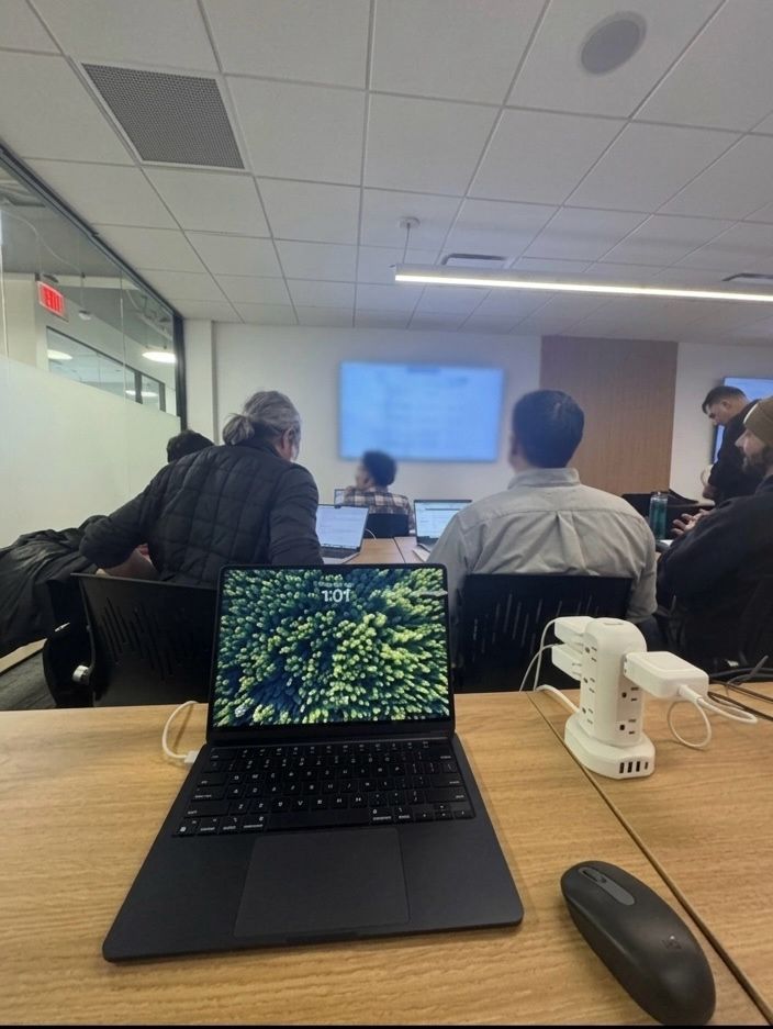 Laptop at a Centific team briefing