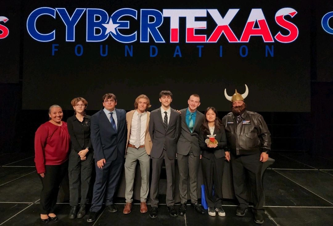 CyberPatriots team on stage at the CyberTexas conference