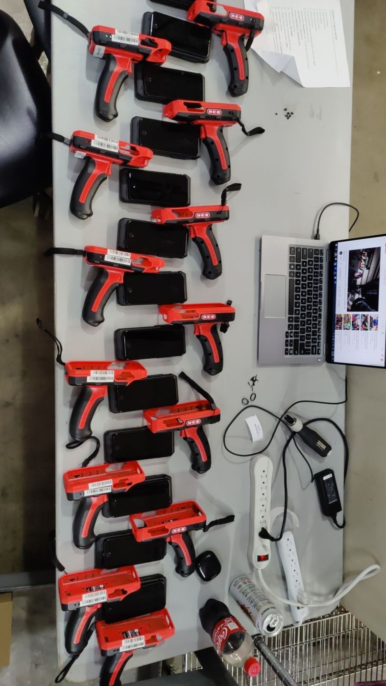 Wall-mounted rack of curbside handheld devices