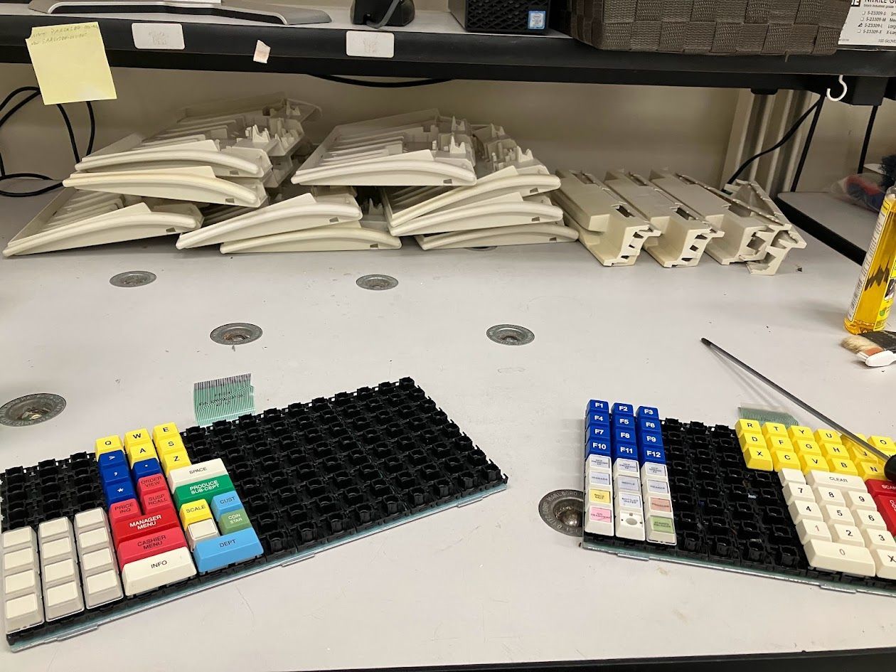 POS keyboard mid-repair with keycaps removed