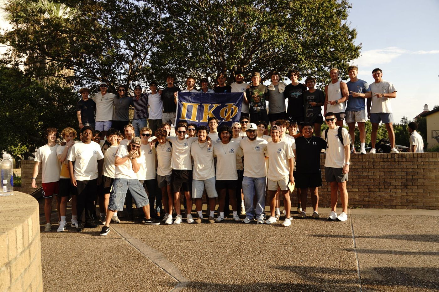 Pi Kappa Phi chapter group photo on campus