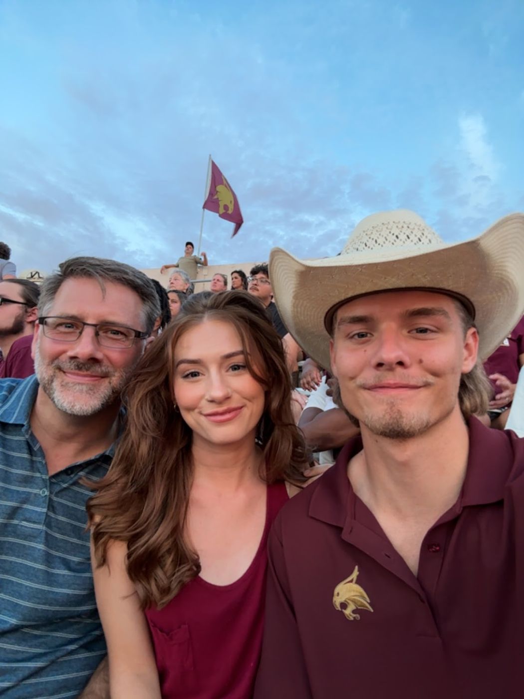 Brian with family at a Texas State football game